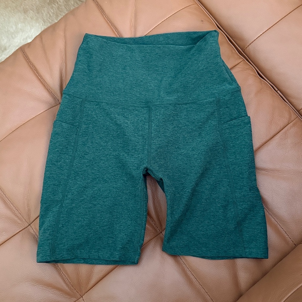 Beyond Yoga Heathered Heather Green High-Rise Bike Shorts with Side Pockets